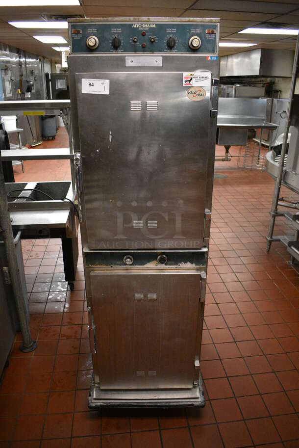 Alto Shaam Model 1000-TH/I Stainless Steel Commercial 2 Half Size Door Cook N Hold Cabinet on Commercial Casters. 208-240 Volts. 25x34x76.5. Unit Was In Working Condition When Restaurant Closed. (kitchen)