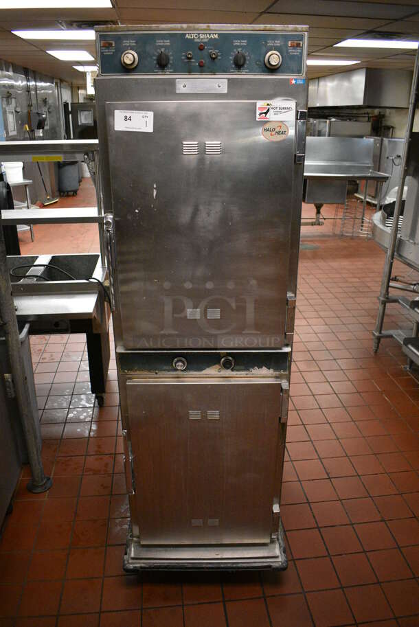 Alto Shaam Model 1000-TH/I Stainless Steel Commercial 2 Half Size Door Cook N Hold Cabinet on Commercial Casters. 208-240 Volts. 25x34x76.5. Unit Was In Working Condition When Restaurant Closed. (kitchen) - Image 1 of 9