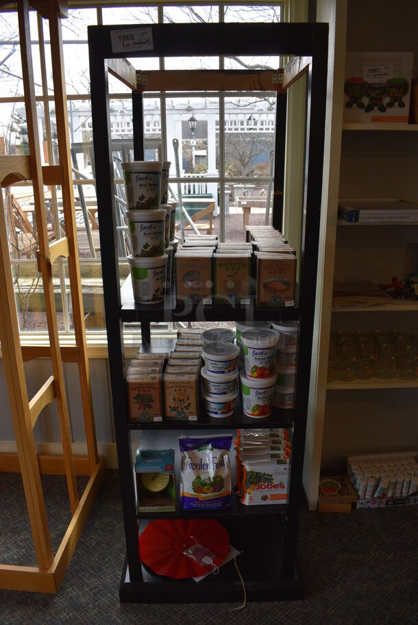 Black Wooden Shelving Unit w/ Contents Including Fertilizer Spikes and Vegetable Garden Fertilizer. BUYER MUST REMOVE. (garden center) - Image 1 of 9