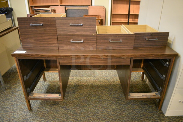 Wooden Desk w/ 5 Drawers. 60x30x29. (gift shop)