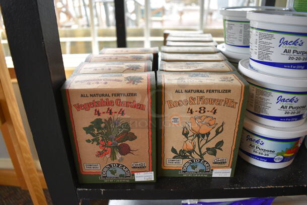 Black Wooden Shelving Unit w/ Contents Including Fertilizer Spikes and Vegetable Garden Fertilizer. BUYER MUST REMOVE. (garden center) - Image 7 of 9