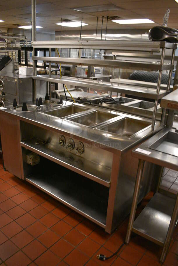 Stainless Steel Commercial Electric Powered 3 Bay Steam Table w/ 2 Plate Return Chutes, Double Over Shelf, 2 Warming Strips and Under Shelf on Commercial Casters. 63x44x64.5. Unit Was In Working Condition When Restaurant Closed. (kitchen) - Image 2 of 8