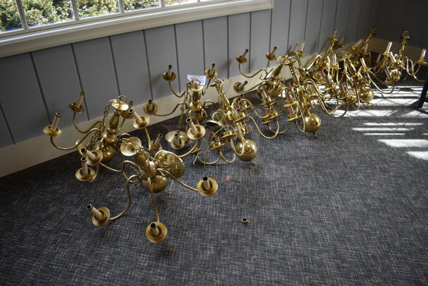10 Gold Finish Metal Chandeliers. Includes 25x25x18. 10 Times Your Bid! (garden center)