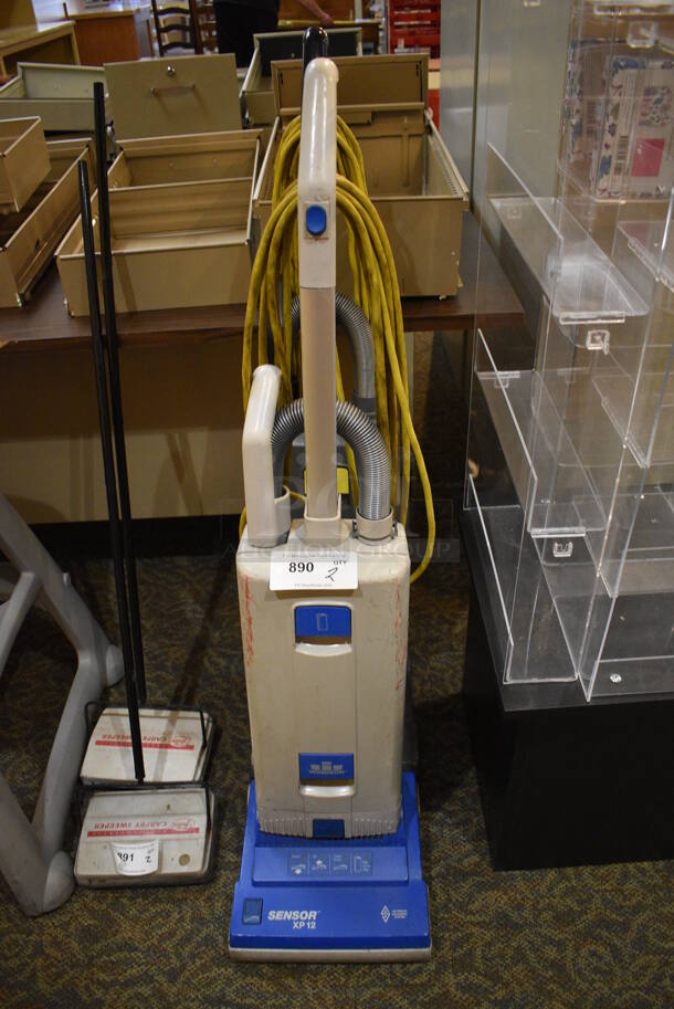 2 Windsor Sensor Commercial Vacuum Cleaners. 12x12x47. 2 Times Your Bid! Unit Was In Working Condition When Restaurant Closed. (gift shop)