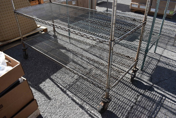 Chrome Finish 4 Tier Shelving Unit on Commercial Casters. BUYER MUST DISMANTLE. PCI CANNOT DISMANTLE FOR SHIPPING. PLEASE CONSIDER FREIGHT CHARGES. 60x24x68. (warehouse)  - Image 3 of 3