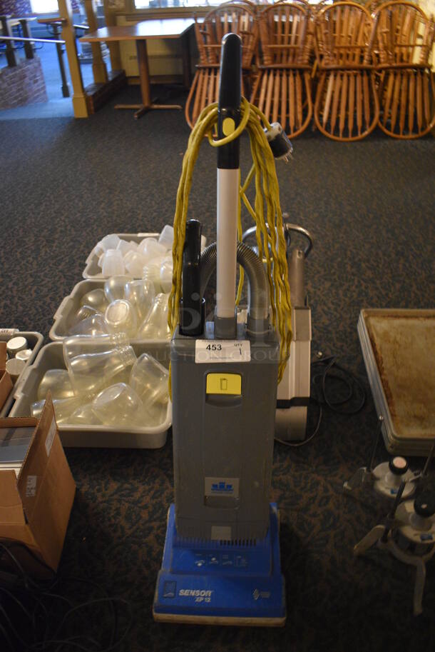 Windsor Sensor XP12 Commercial Vacuum Cleaner. 12x12x45. (main dining room)
