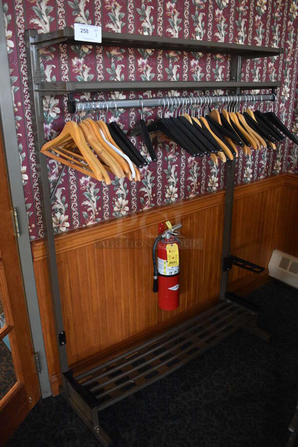 Brown Metal Coat Hanger Rack w/ Hangers. 49.5x18x69. (sunroom dining room)