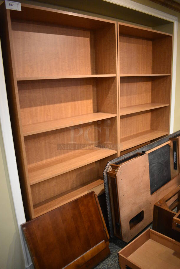 2 Wood Pattern Bookshelves. 40x12x84. 2 Times Your Bid! (gift shop)