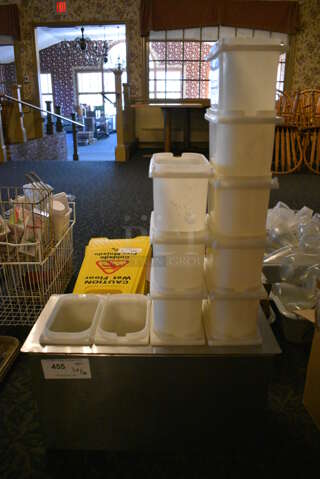 Metal Bin w/ 12 White Poly Bins. 21x9.5x12. (main dining room)