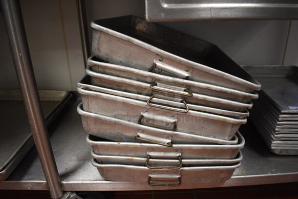 9 Metal Baking Pans. 17.5x26x3.5, 17.5x26x2.5. 9 Times Your Bid! (drop in bin kitchen)