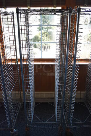Metal Commercial Pan Transport Rack on Commercial Casters. 22x26x68. (sunroom dining room)