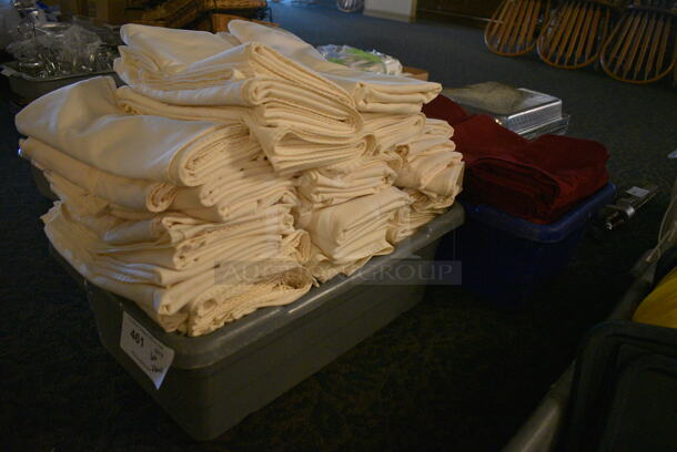 ALL ONE MONEY! Lot of 2 Poly Bins of White and Red Tablecloths! 24x16x8.5. 54x54. (main dining room) - Image 1 of 5