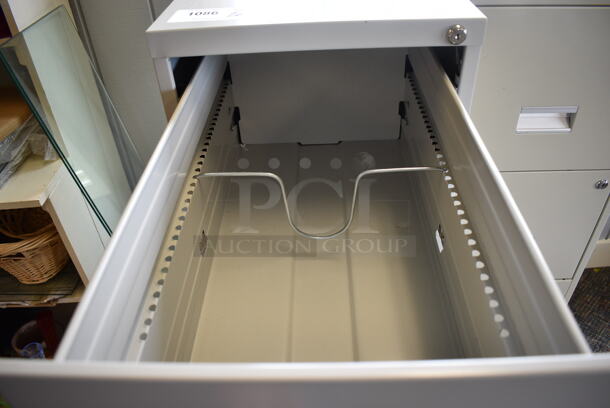 2 Metal 4 Drawer Filing Cabinets. 15x27x52, 15x18x52. 2 Times Your Bid! (garden center) - Image 4 of 6