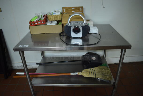 Stainless Steel Commercial Table w/ Contents Including Radio and Broom. 48x30x33.5. (bakery kitchen) - Image 1 of 5