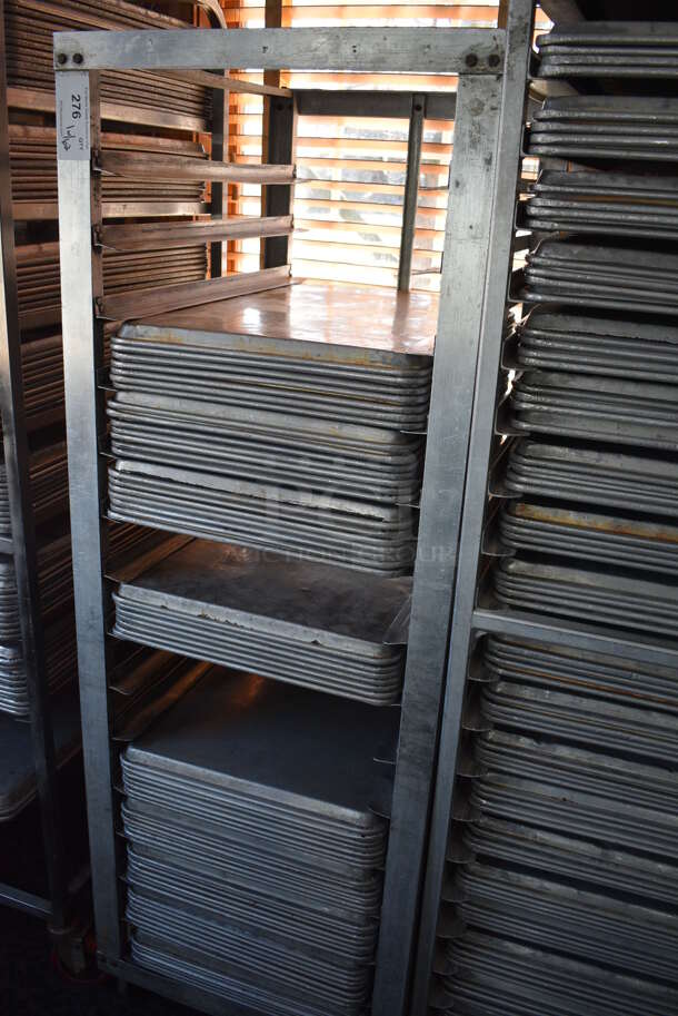 Metal Commercial Pan Transport Rack w/ 62 Metal Full Size Baking Pans on Commercial Casters. 22.5x26.5x64. 18x26x1. (sunroom dining room) - Image 3 of 6