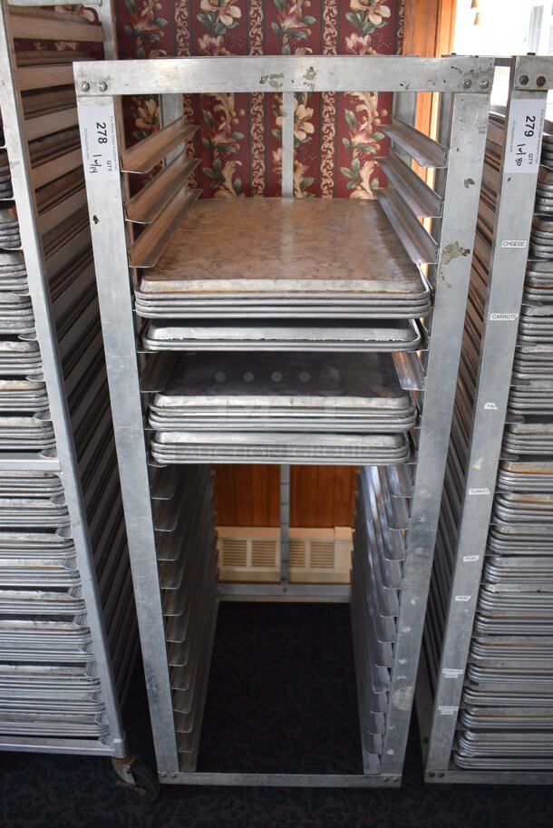 Metal Commercial Pan Transport Rack w/ 14 Metal Full Size Baking Pans on Commercial Casters. 22.5x26.5x64. 18x26x1. (sunroom dining room) - Image 1 of 5