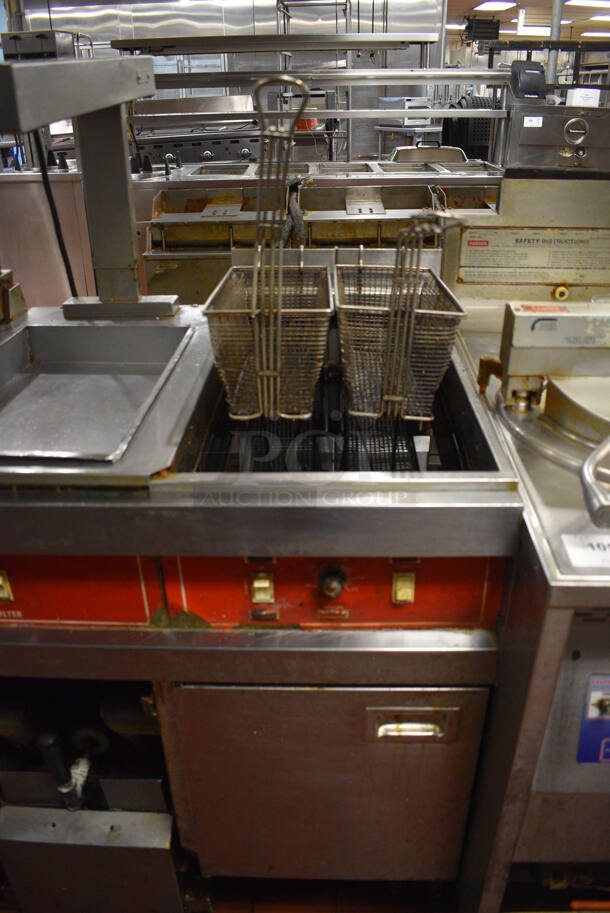 Vulcan Model SPERI-SESFABZ Stainless Steel Commercial Floor Style Electric Powered 2 Bay Fryer w/ Center Dumping Warming Station, Warming Strip and 4 Metal Fry Baskets. 208 Volts, 3 Phase. 46.5x28.5x53. Unit Was In Working Condition When Restaurant Closed. (kitchen) - Image 3 of 10