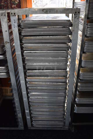 Metal Commercial Pan Transport Rack w/ 80 Metal Full Size Baking Pans on Commercial Casters. 22.5x26.5x64. 18x26x1. (sunroom dining room)
