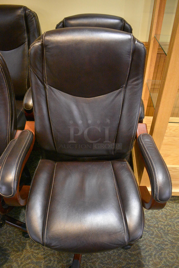 4 Office Chairs w/ Arm Rests on Casters. 27x22x46. 4 Times Your Bid! (gift shop) - Image 2 of 3