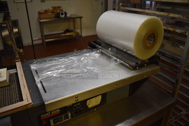 Heat Seal Model HS-1520D Metal Commercial Countertop Heat Sealer w/ 2 Boxes of Tufflex Premium Shrink Film. 115 Volts, 1 Phase. 51x22x12. Unit Was In Working Condition When Restaurant Closed. (bakery kitchen) - Image 3 of 11
