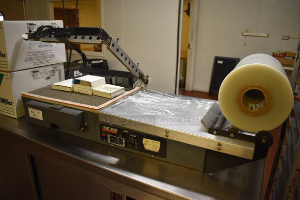 Heat Seal Model HS-1520D Metal Commercial Countertop Heat Sealer w/ 2 Boxes of Tufflex Premium Shrink Film. 115 Volts, 1 Phase. 51x22x12. Unit Was In Working Condition When Restaurant Closed. (bakery kitchen) - Image 4 of 11
