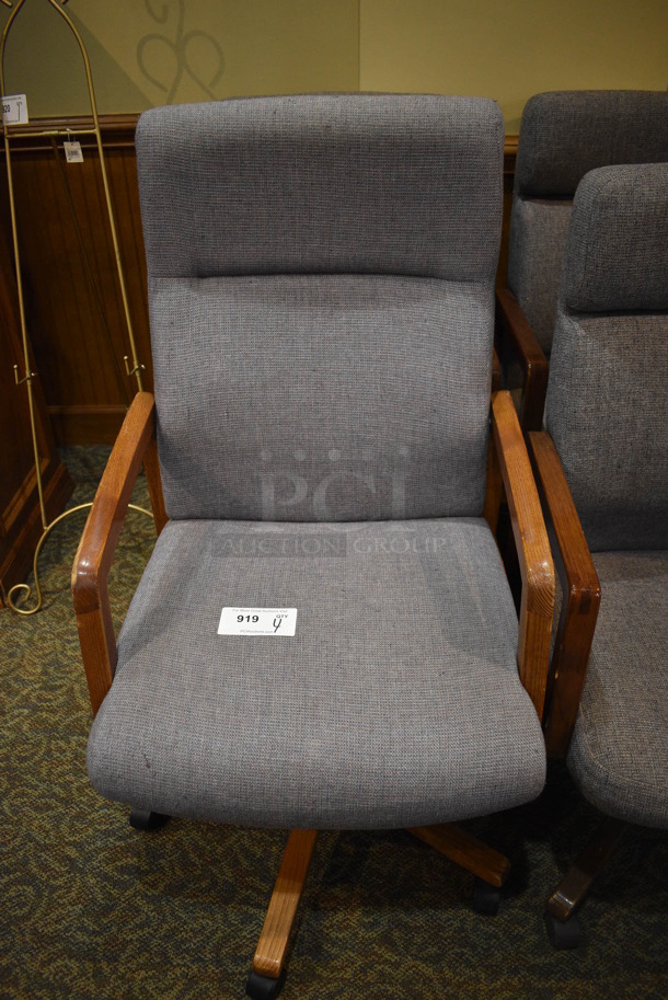 4 Gray Office Chairs w/ Wooden Arm Rests on Casters. Includes 23x24x40. 4 Times Your Bid! (gift shop)