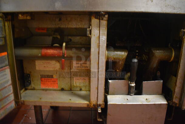 Vulcan Model SPERI-SESFABZ Stainless Steel Commercial Floor Style Electric Powered 2 Bay Fryer w/ Center Dumping Warming Station, Warming Strip and 4 Metal Fry Baskets. 208 Volts, 3 Phase. 46.5x28.5x53. Unit Was In Working Condition When Restaurant Closed. (kitchen) - Image 8 of 10