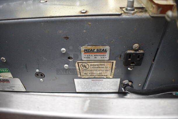 Heat Seal Model HS-1520D Metal Commercial Countertop Heat Sealer w/ 2 Boxes of Tufflex Premium Shrink Film. 115 Volts, 1 Phase. 51x22x12. Unit Was In Working Condition When Restaurant Closed. (bakery kitchen) - Image 9 of 11