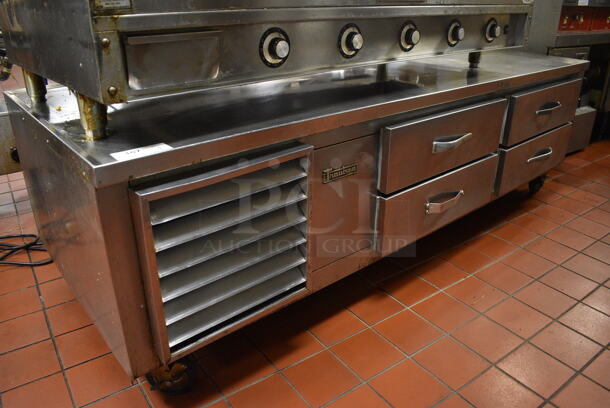 Traulsen Stainless Steel Commercial 4 Drawer Chef Base on Commercial Casters. 81.5x34.5x25.5. Unit Was In Working Condition When Restaurant Closed. (kitchen)