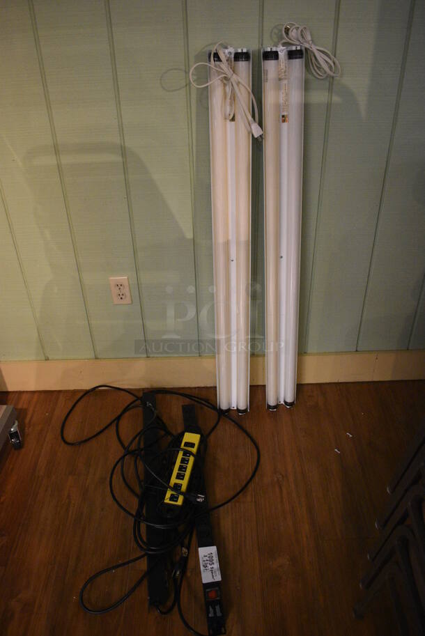ALL ONE MONEY! Lot of 3 Power Strips and 2 Lights! Includes 48x5x2.5. (garden center)