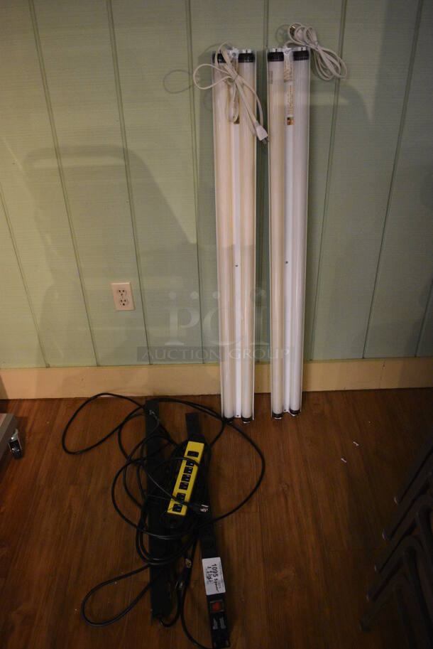 ALL ONE MONEY! Lot of 3 Power Strips and 2 Lights! Includes 48x5x2.5. (garden center) - Image 1 of 3
