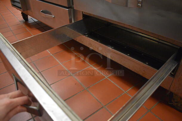 Traulsen Stainless Steel Commercial 4 Drawer Chef Base on Commercial Casters. 81.5x34.5x25.5. Unit Was In Working Condition When Restaurant Closed. (kitchen) - Image 4 of 7