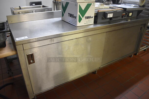 Stainless Steel Commercial Table w/ 2 Doors, Back Splash and Under Shelf. Does Not Include Contents. 90x27x40. (bakery kitchen) - Image 2 of 4