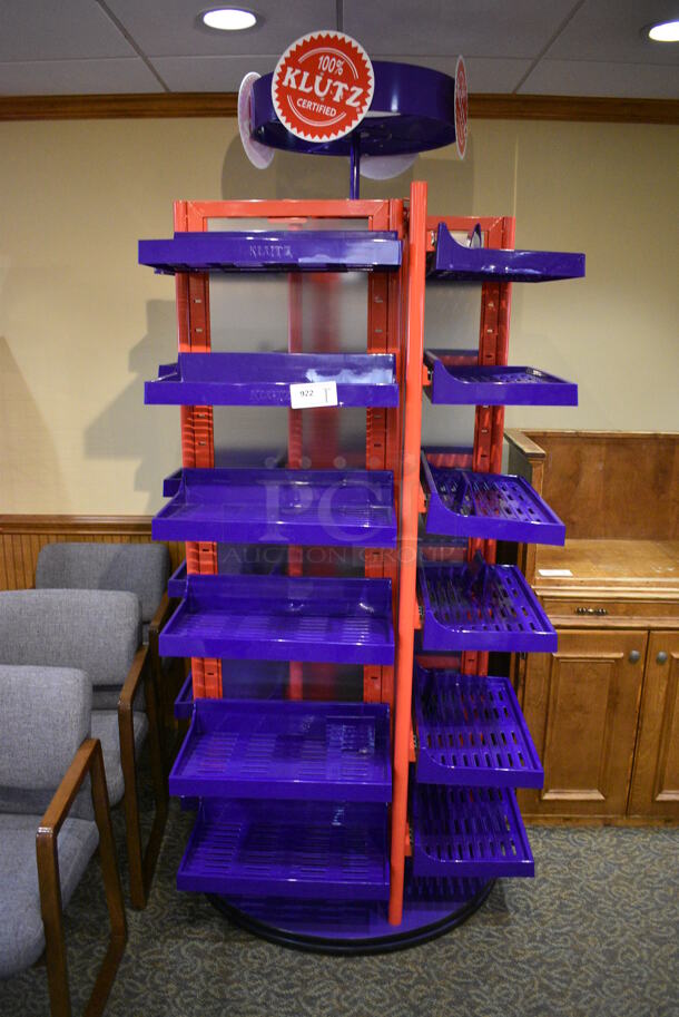 Red Metal Shelving Unit w/ Purple Poly Shelves. 42x42x95. (gift shop)