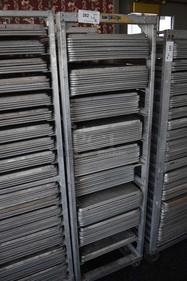 Metal Commercial Pan Transport Rack w/ 81 Metal Full Size Baking Pans on Commercial Casters. 20.5x26x68.5. 18x26x1. (sunroom dining room) - Image 2 of 5