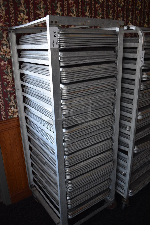Metal Commercial Pan Transport Rack w/ 78 Metal Full Size Baking Pans on Commercial Casters. 22.5x26.5x66. 18x26x1. (sunroom dining room) - Image 2 of 5