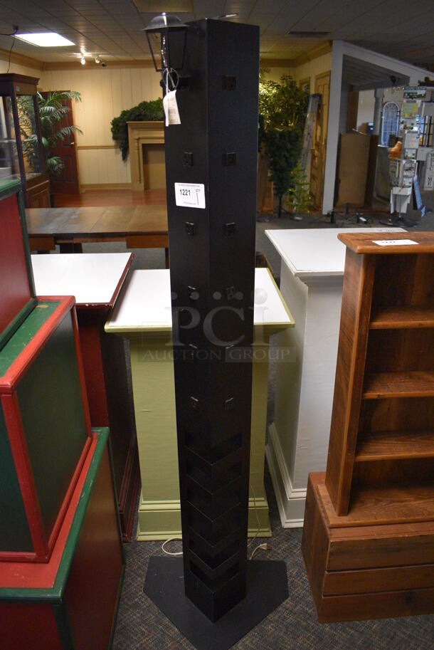 Black Power Strip Stand. 20x17x67. (garden center) - Image 1 of 4