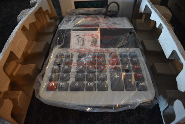 BRAND NEW IN BOX! Canon Model MP27D Printing Calculator. 9x12.5x3. (main dining room)