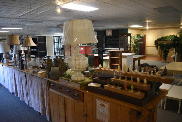 ALL ONE MONEY! Lot of Wooden Counter and Various Contents Including Lamps! BUYER MUST REMOVE. 235x28x36 (garden center)