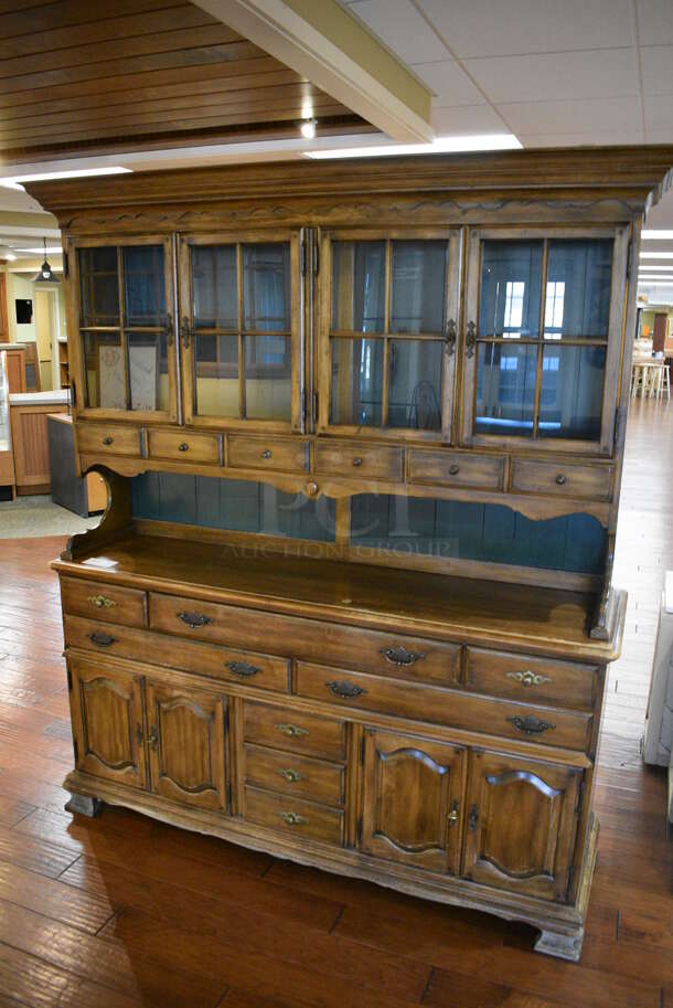 Wooden Cabinet w/ 4 Glass Doors, Drawers and Doors. 65x19x76.5. (gift shop)