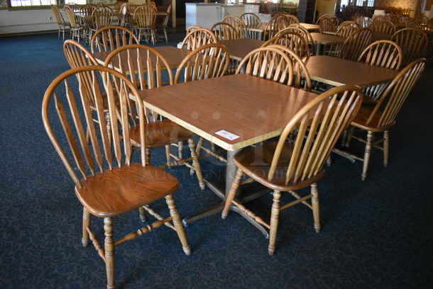 4 Wooden Tables w/ 16 Wooden Dining Chairs. 36x36x30. 18x17.5x37.5. 4 Times Your Bid! (main dining room)

