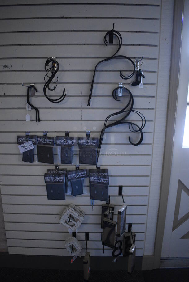 ALL ONE MONEY! Lot of Various Items Including Light Switch Covers! (garden center) - Image 1 of 3
