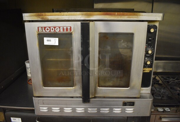 Blodgett Stainless Steel Commercial Natural Gas Powered Full Size Convection Oven w/ View Through Doors, Metal Oven Racks and Thermostatic Controls. 38x39x32. Unit Was In Working Condition When Restaurant Closed. (bakery kitchen)