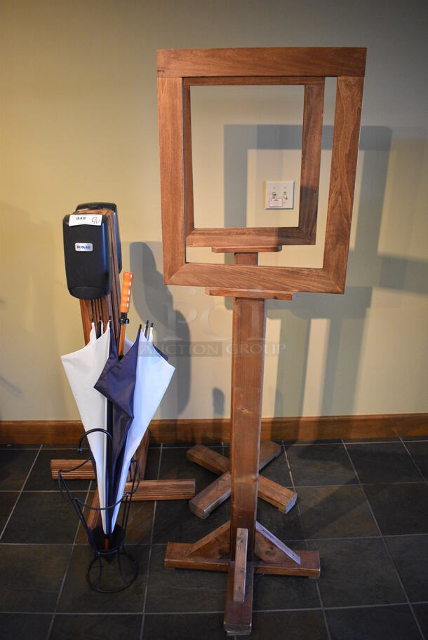 4 Various Items; Umbrella Stand, Hand Sanitizer Stand and 2 Wooden Stands. Includes 24x24x67. 4 Times Your Bid! (gift shop) - Image 1 of 4