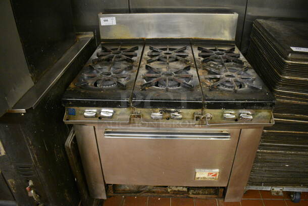 Southbend Stainless Steel Commercial Natural Gas Powered 6 Burner Range w/ Oven and Back Splash. 36x33x44. Unit Was In Working Condition When Restaurant Closed. (bakery kitchen) - Image 1 of 8