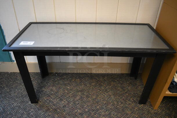 Black Wooden Table w/ Metal Tabletop. 48x22x26. (garden center)
