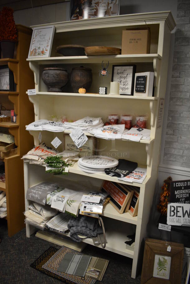 White Wooden Shelving Unit w/ Contents Including Signs, Towels and Mats! BUYER MUST REMOVE. 48x20x85. (garden center)