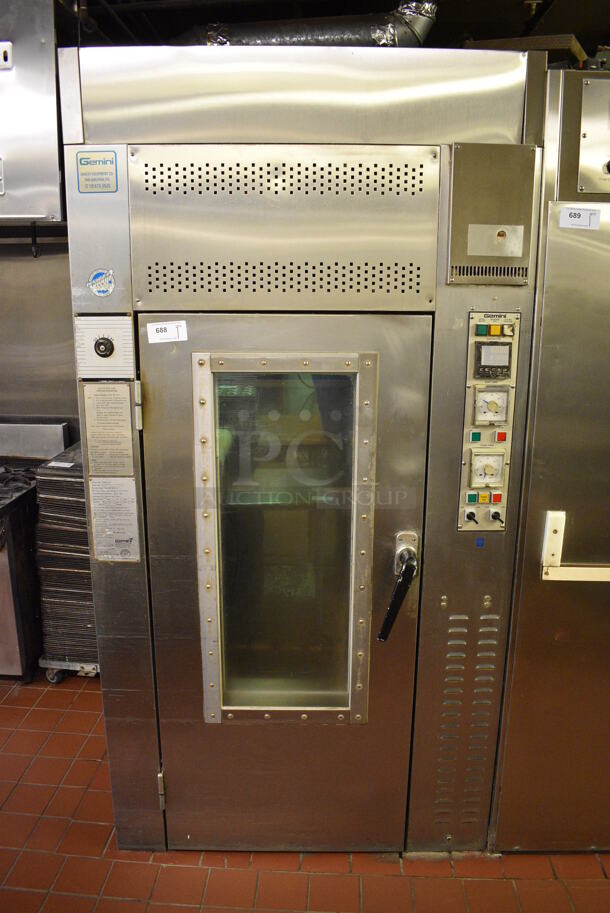 Gemini Model 1000 LTG Stainless Steel Commercial Floor Style Natural Gas Powered Single Door Roll In Rack Steam Oven w/ Metal Pan Transport Rack. 143,000 BTU. 47.5x50x93. Unit Was In Working Condition When Restaurant Closed. (bakery kitchen)