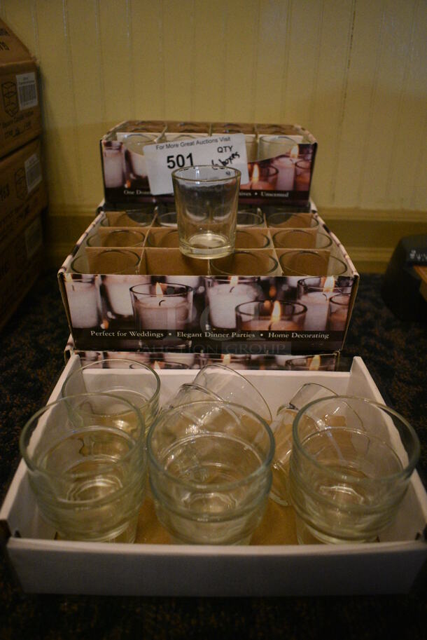 ALL ONE MONEY! Lot of 6 Boxes of Glass Candle Holders! 69 Holders Total. 2x2x2.5, 2.75x2.75x2.5. (main dining room)