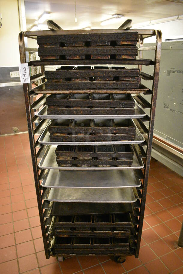 Metal Commercial Pan Transport Rack w/ 30 Various Metal 4 Loaf Baking Pans on Commercial Casters. 28.5x18x69.5. Includes 20x9x2.5. (bakery kitchen)